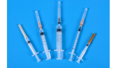 Sterile auto-disable syringes for single use